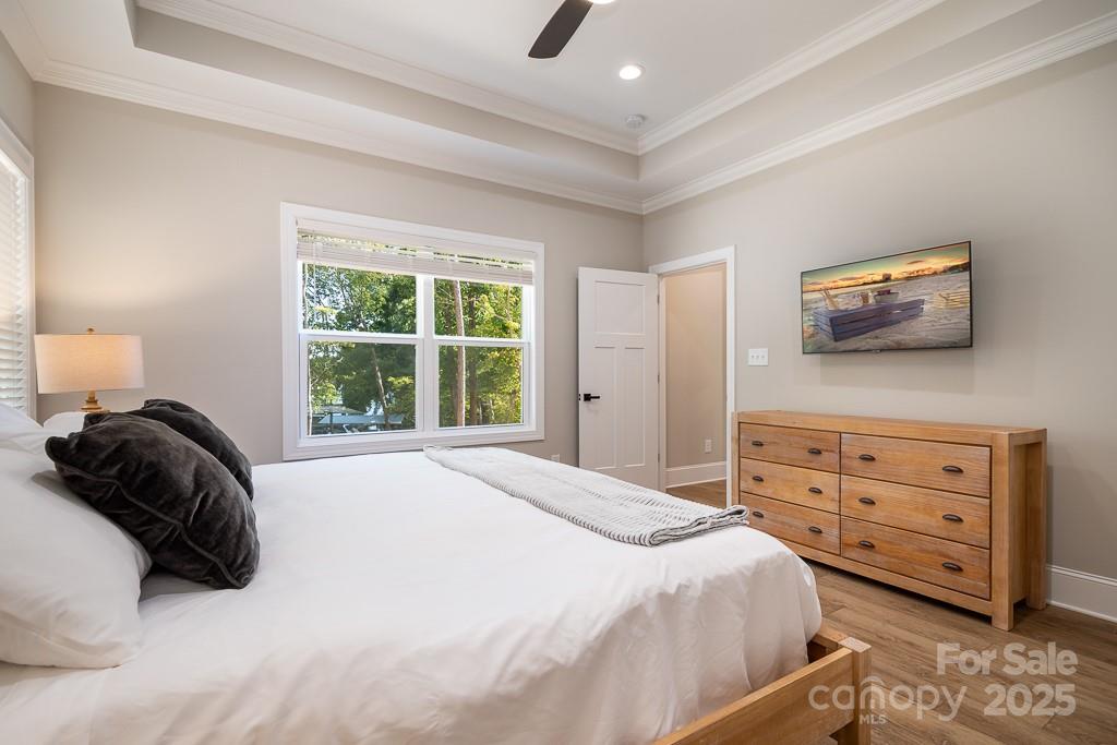 787 Morrison Farm Road Troutman, NC 28166 - Photo 14 of 24 a bedroom with a bed and a window