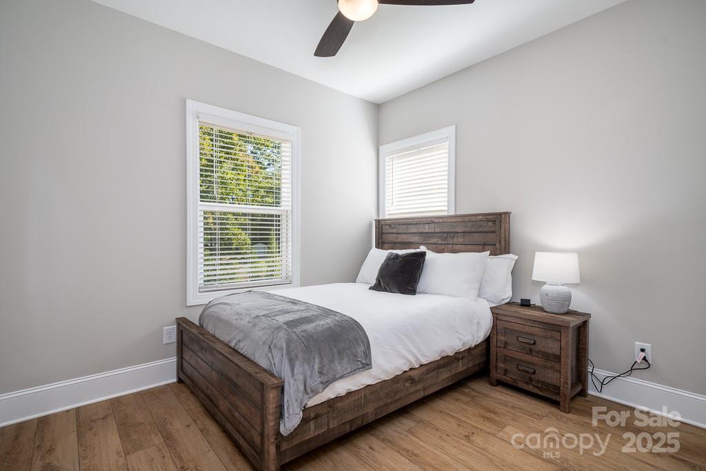 787 Morrison Farm Road Troutman, NC 28166 - Photo 15 of 24 a bedroom with a bed and window