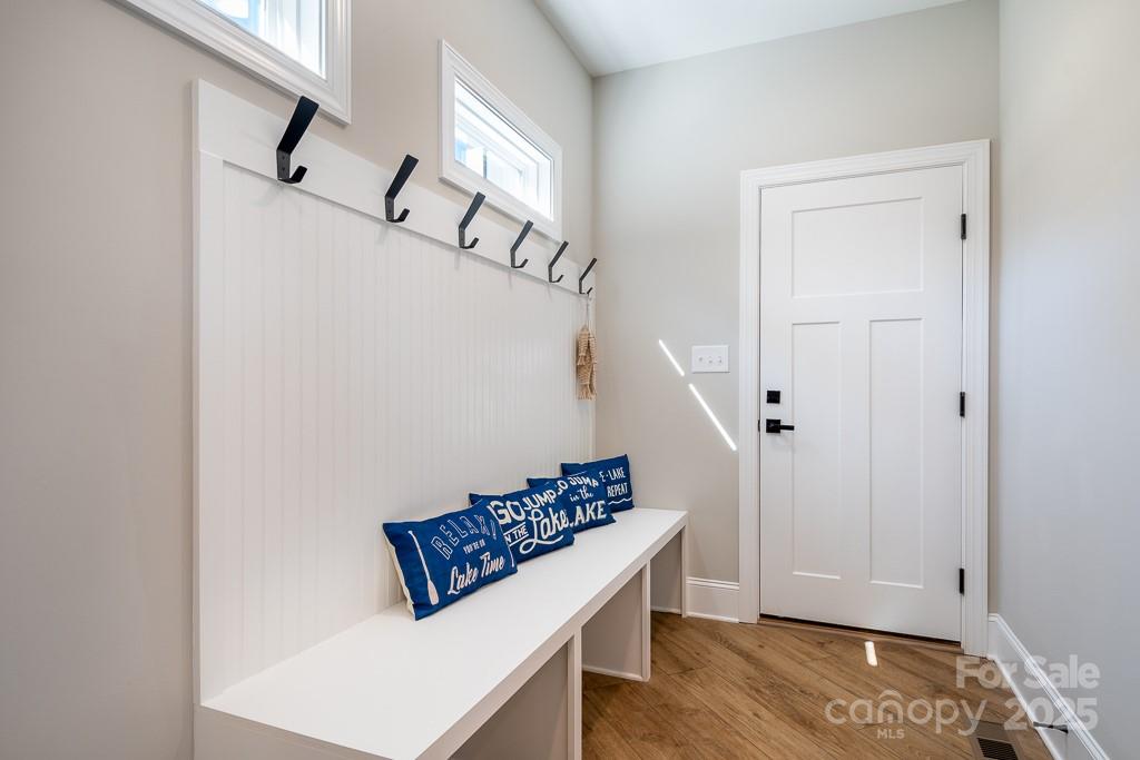 787 Morrison Farm Road Troutman, NC 28166 - Photo 21 of 24 a view of entryway with hardwood floor and hallway