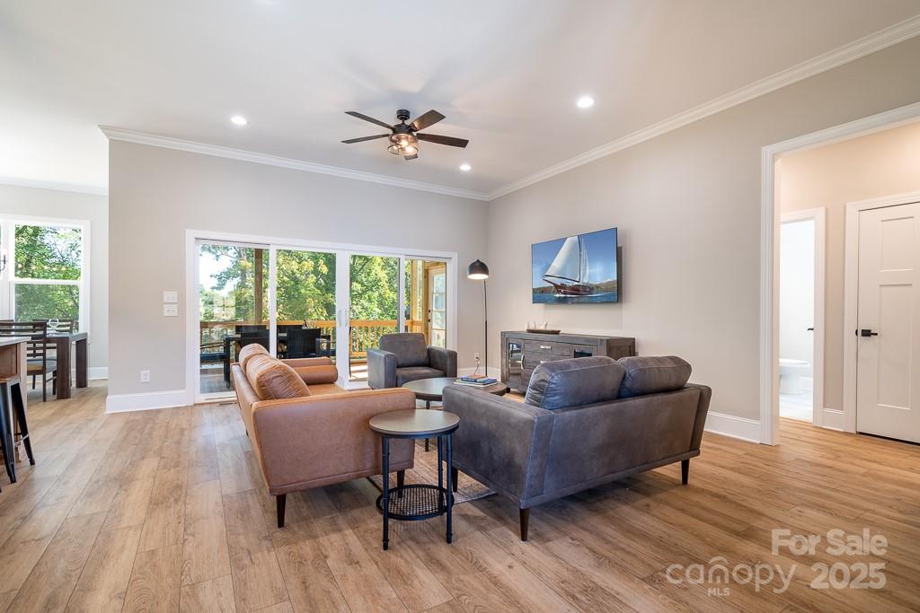 787 Morrison Farm Road Troutman, NC 28166 - Photo 10 of 24 a living room with furniture and a large window