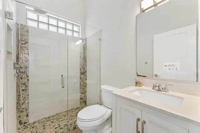 a view of storage and utility room with washer and dryer