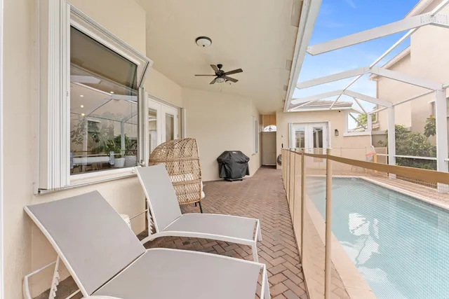 a view of an outside dining space with furniture