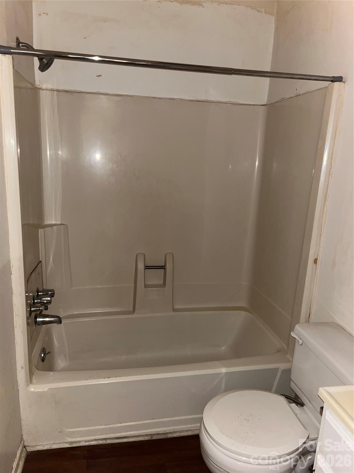 6957 Vintage Road Lilesville, NC 28091 - Photo 10 of 10 a bathroom with a bathtub and a shower