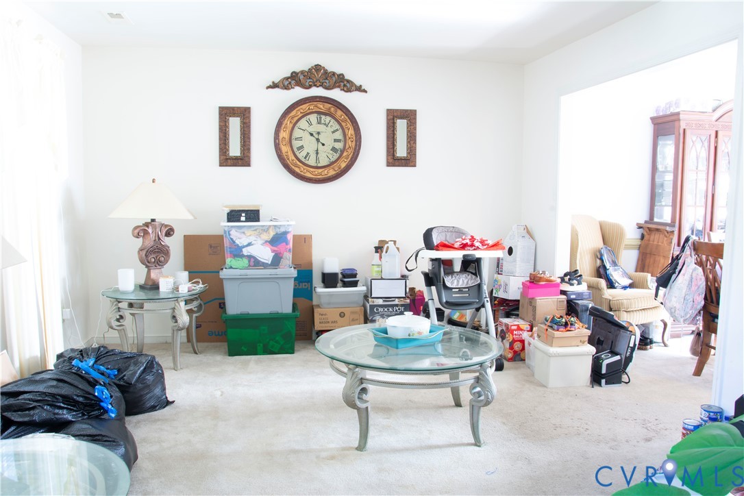 5781 Swanson Road Richmond, VA 23225 - Photo 2 of 16 Living area featuring carpet floors