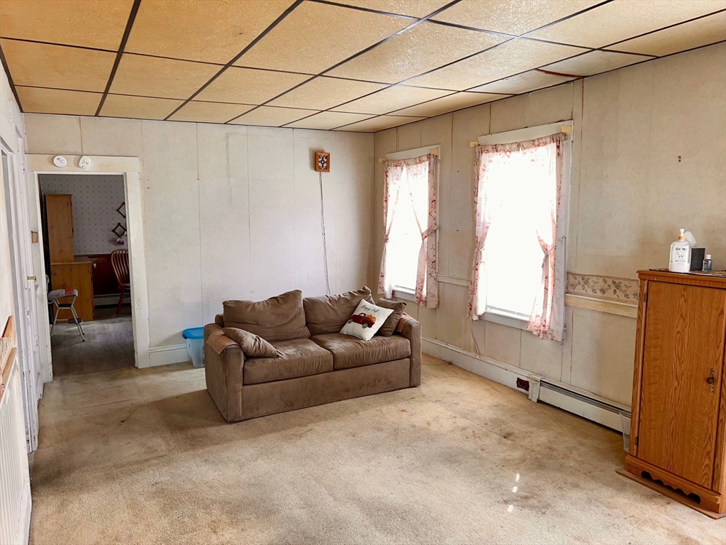 7 Myrtle Street Middleboro, MA 02346 - Photo 8 of 21 a living room with furniture and a window