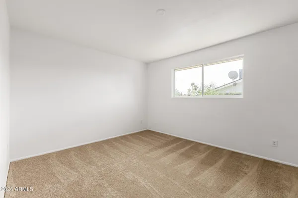 an empty room with a window