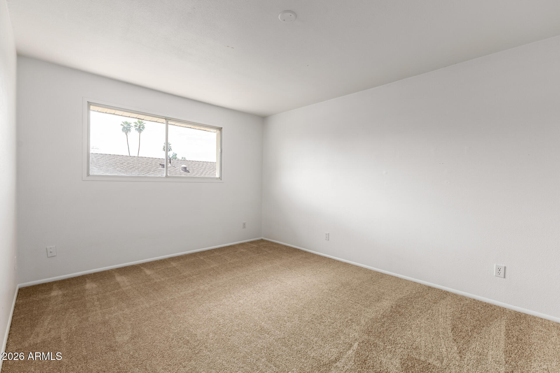 4617 South Grandview Avenue Tempe, AZ 85282 - Photo 21 of 31 an empty room with a window