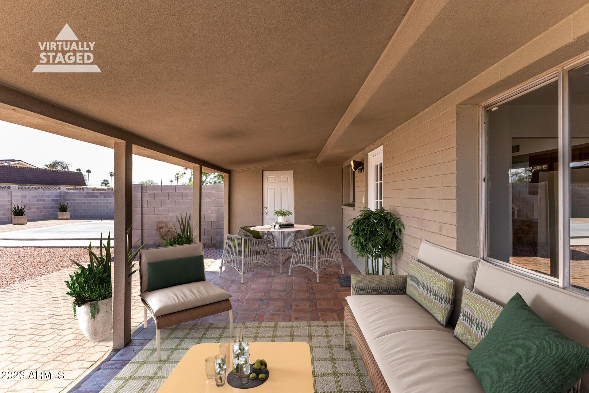 4617 South Grandview Avenue Tempe, AZ 85282 - Photo 24 of 31 a view of a patio with couches and potted plants