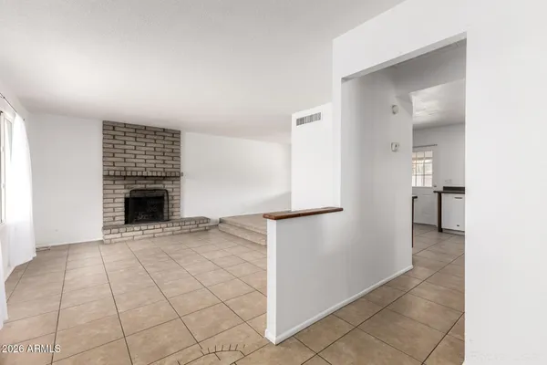 a view of a livingroom with a fireplace