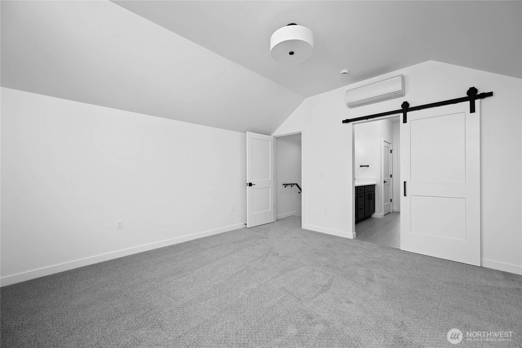 3906 Crosswinds Court Anacortes, WA 98221 - Photo 11 of 16 a view of a room with white walls and refrigerator