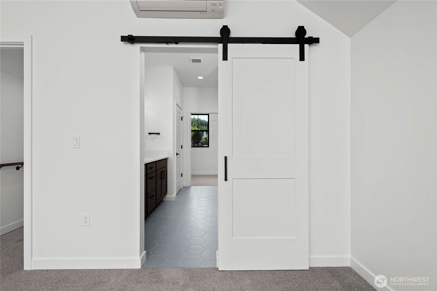 3906 Crosswinds Court Anacortes, WA 98221 - Photo 12 of 16 a view of a hallway with closet