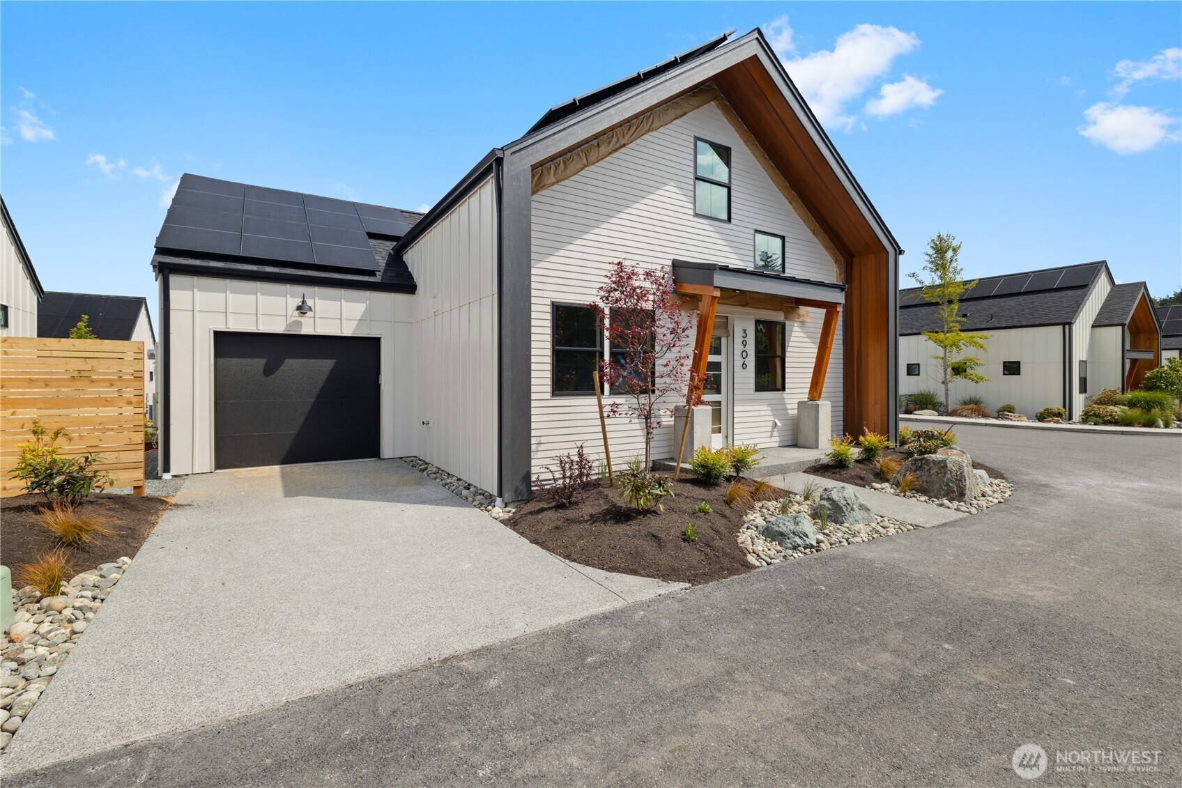 3906 Crosswinds Court Anacortes, WA 98221 - Photo 2 of 16 a front view of a house with patio