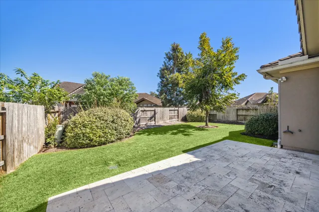 a view of a house with a garden
