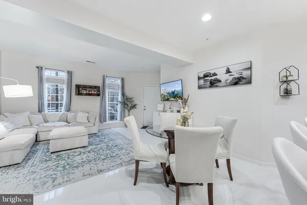 a living room with furniture and a couch