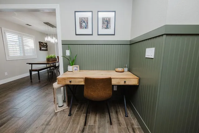 a view of a livingroom with furniture and window