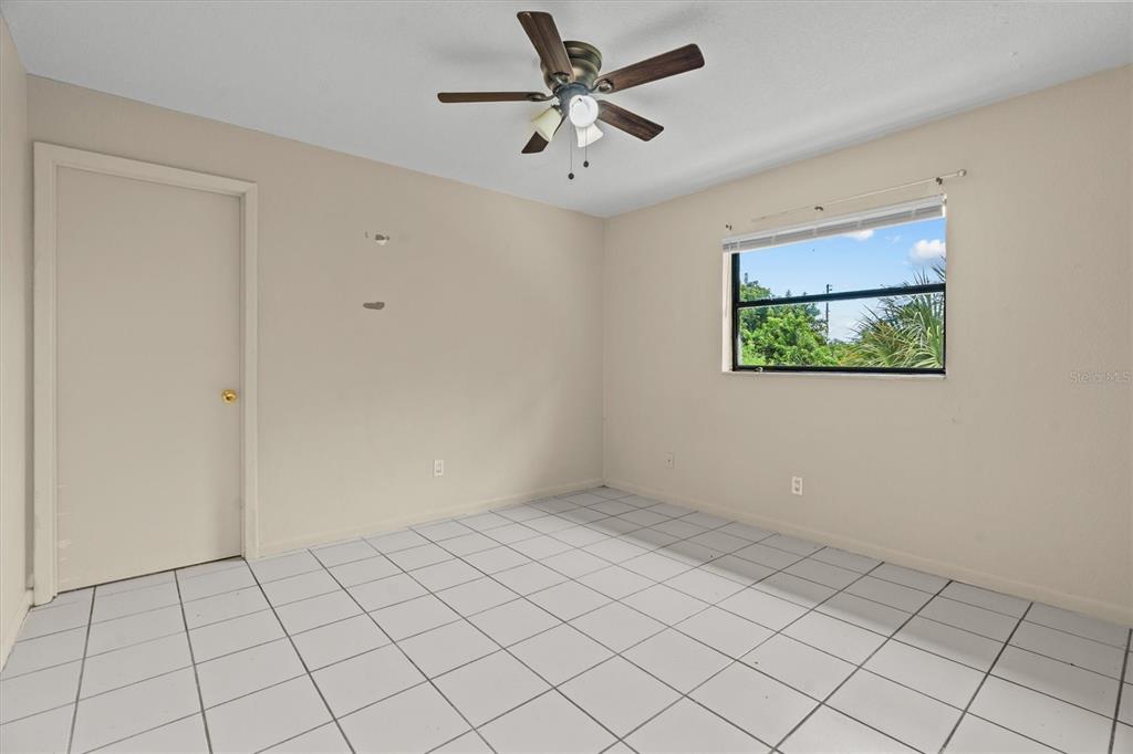 27242 Sunnybrook Road Punta Gorda, FL 33983 - Photo 14 of 36 a view of an empty room