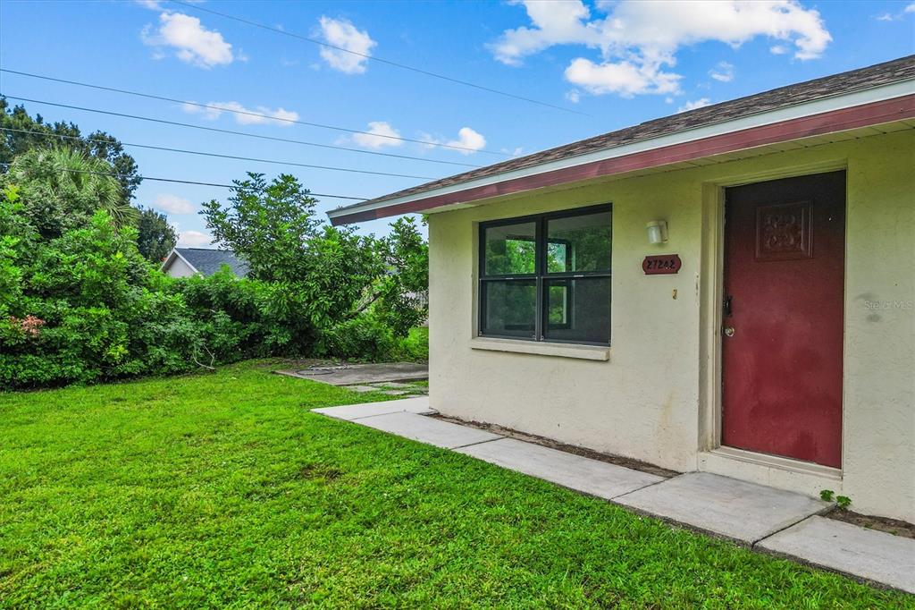 27242 Sunnybrook Road Punta Gorda, FL 33983 - Photo 20 of 36 a view of a back yard of the house