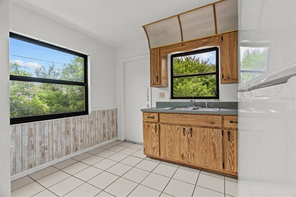 27242 Sunnybrook Road Punta Gorda, FL 33983 - Photo 23 of 36 a view of a door and an empty room