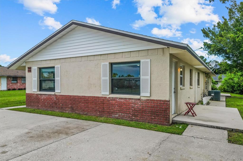27242 Sunnybrook Road Punta Gorda, FL 33983 - Photo 6 of 36 a view of front a house with a yard