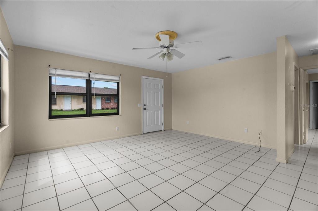 27242 Sunnybrook Road Punta Gorda, FL 33983 - Photo 9 of 36 a view of an empty room and window