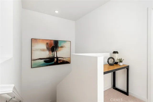 a view of a living room and bathroom