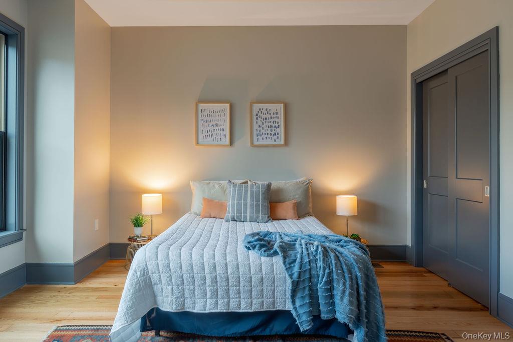 4 Icehouse Drive Saugerties, NY 12477 - Photo 22 of 34 Bedroom featuring light wood finished floors and a closet