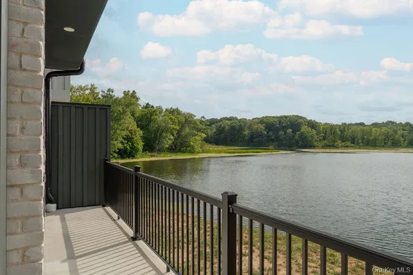 a view of a lake from a balcony