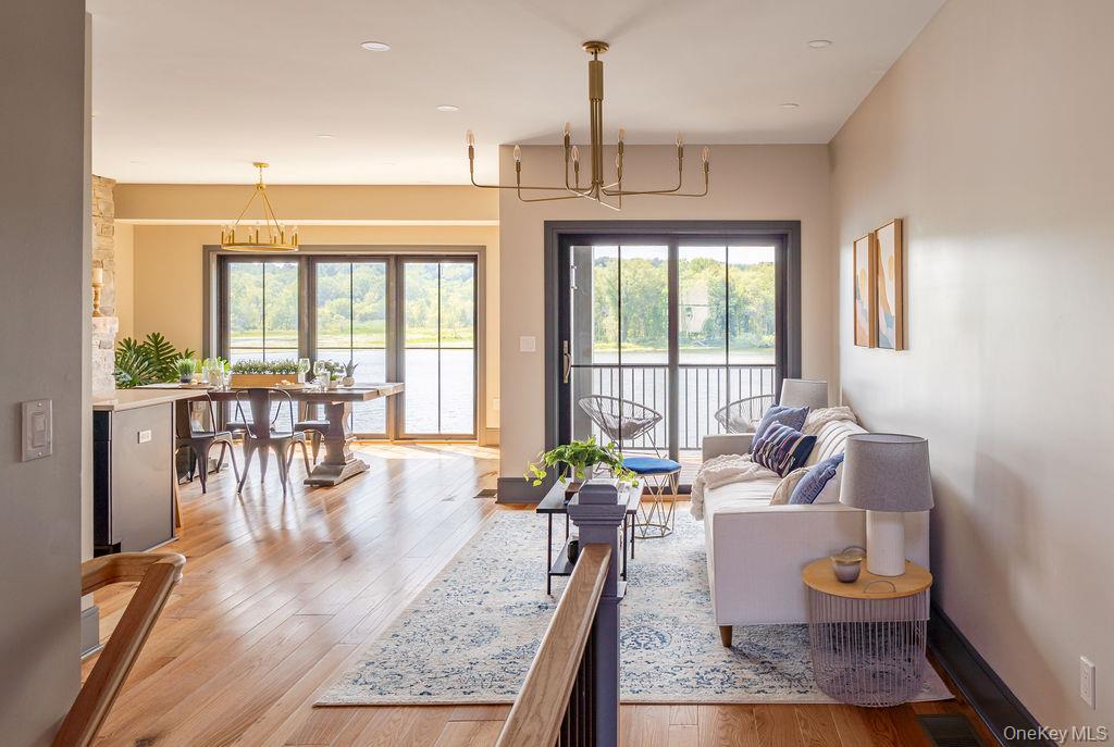 4 Icehouse Drive Saugerties, NY 12477 - Photo 4 of 34 Living area featuring a chandelier, plenty of natural light, light wood-type flooring, and recessed lighting
