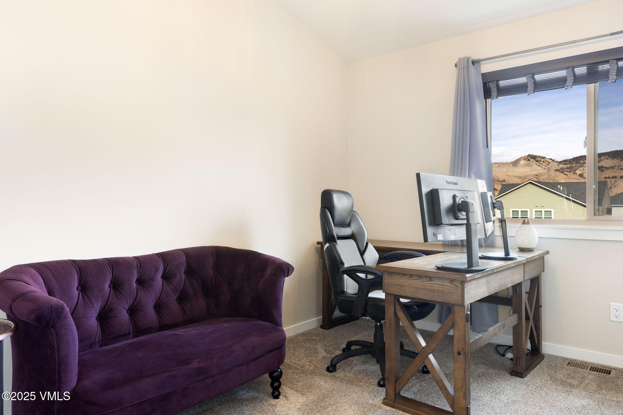 406 Chickadee Lane Gypsum, CO 81637 - Photo 17 of 24 a living room with furniture and a window