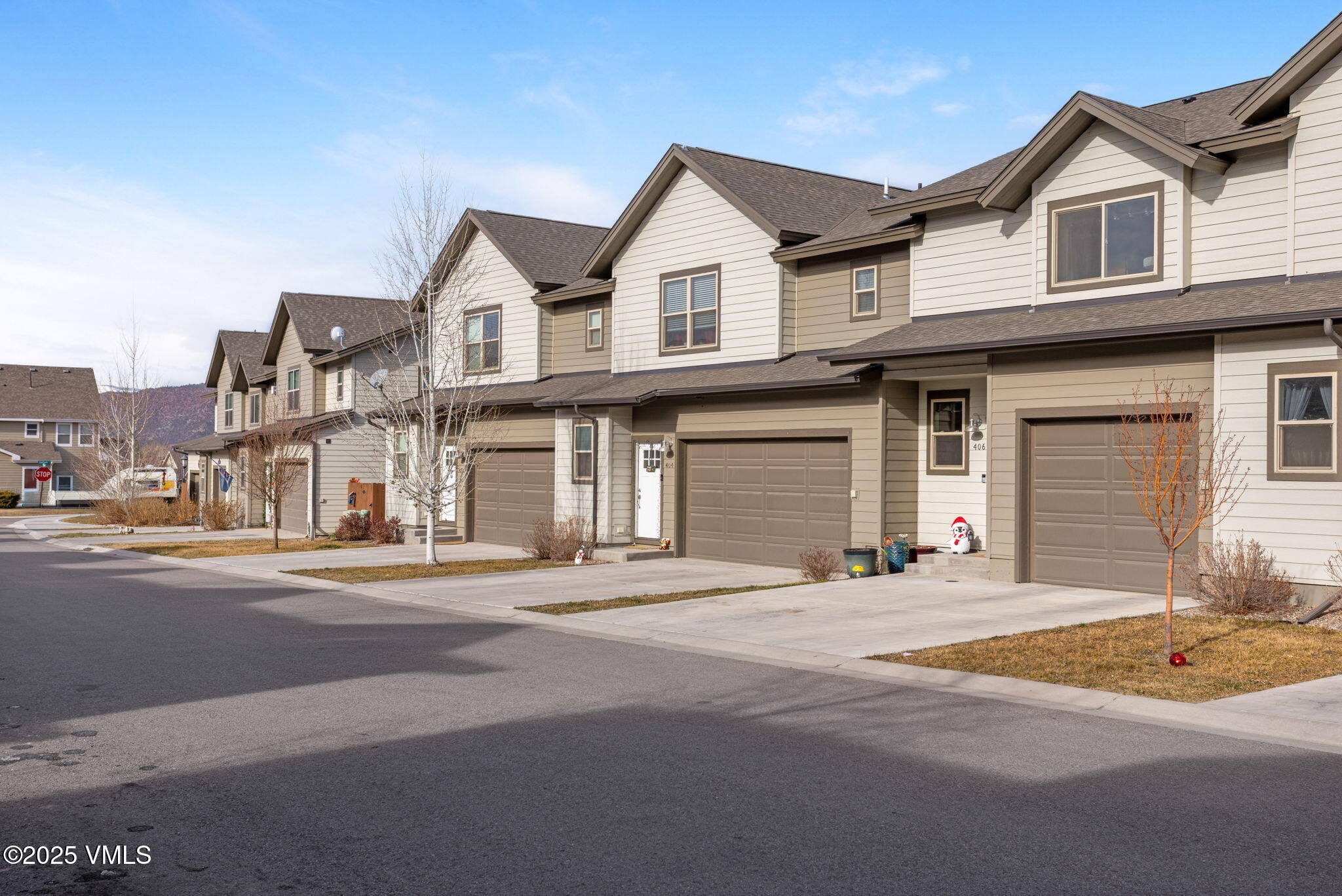 406 Chickadee Lane Gypsum, CO 81637 - Photo 2 of 24 a view of a white house with a large windows