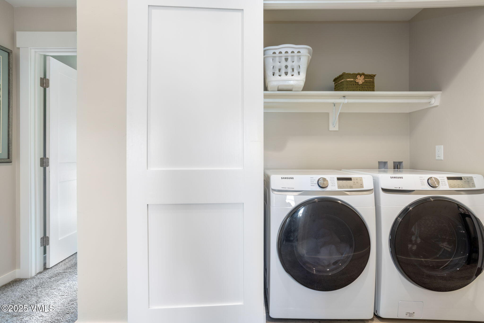 406 Chickadee Lane Gypsum, CO 81637 - Photo 22 of 24 a utility room with dryer and washer