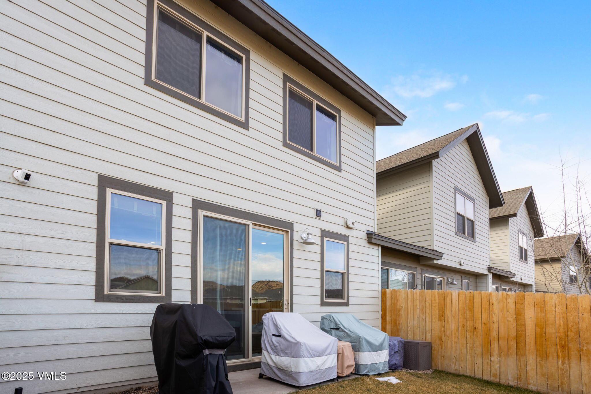 406 Chickadee Lane Gypsum, CO 81637 - Photo 24 of 24 a view of a patio with couches chairs and potted plants
