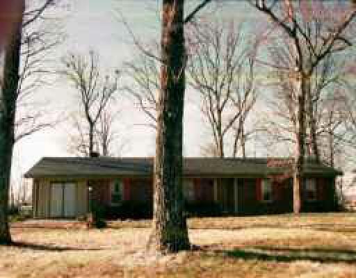 2665 Edwardsville Road Hardy, VA 24101 - Photo 1 of 1 a front view of a house with a yard and garage