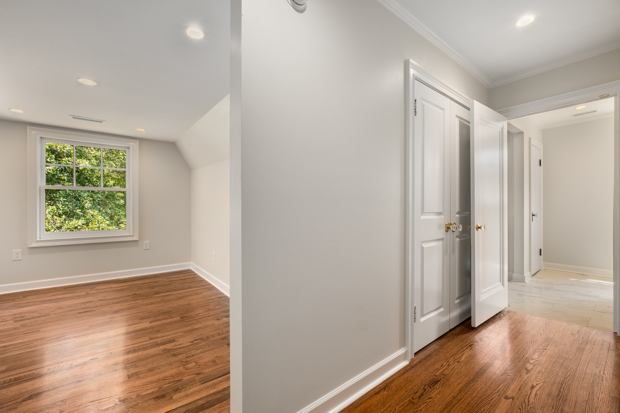 205 Mockingbird Road Nashville, TN 37205 - Photo 12 of 18 a view of hallway with window and wooden floor