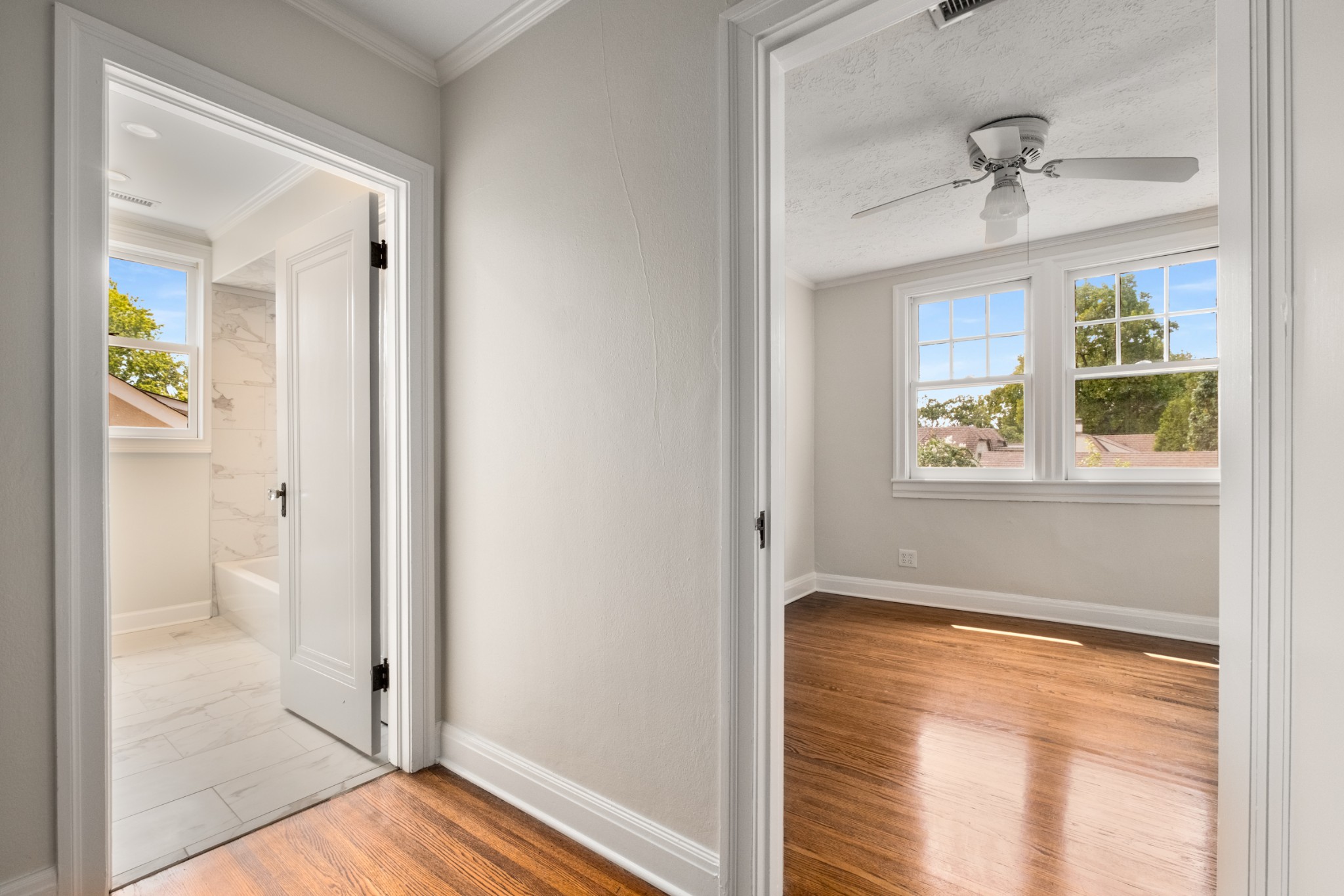 205 Mockingbird Road Nashville, TN 37205 - Photo 14 of 18 a bathroom with a glass shower door and a window