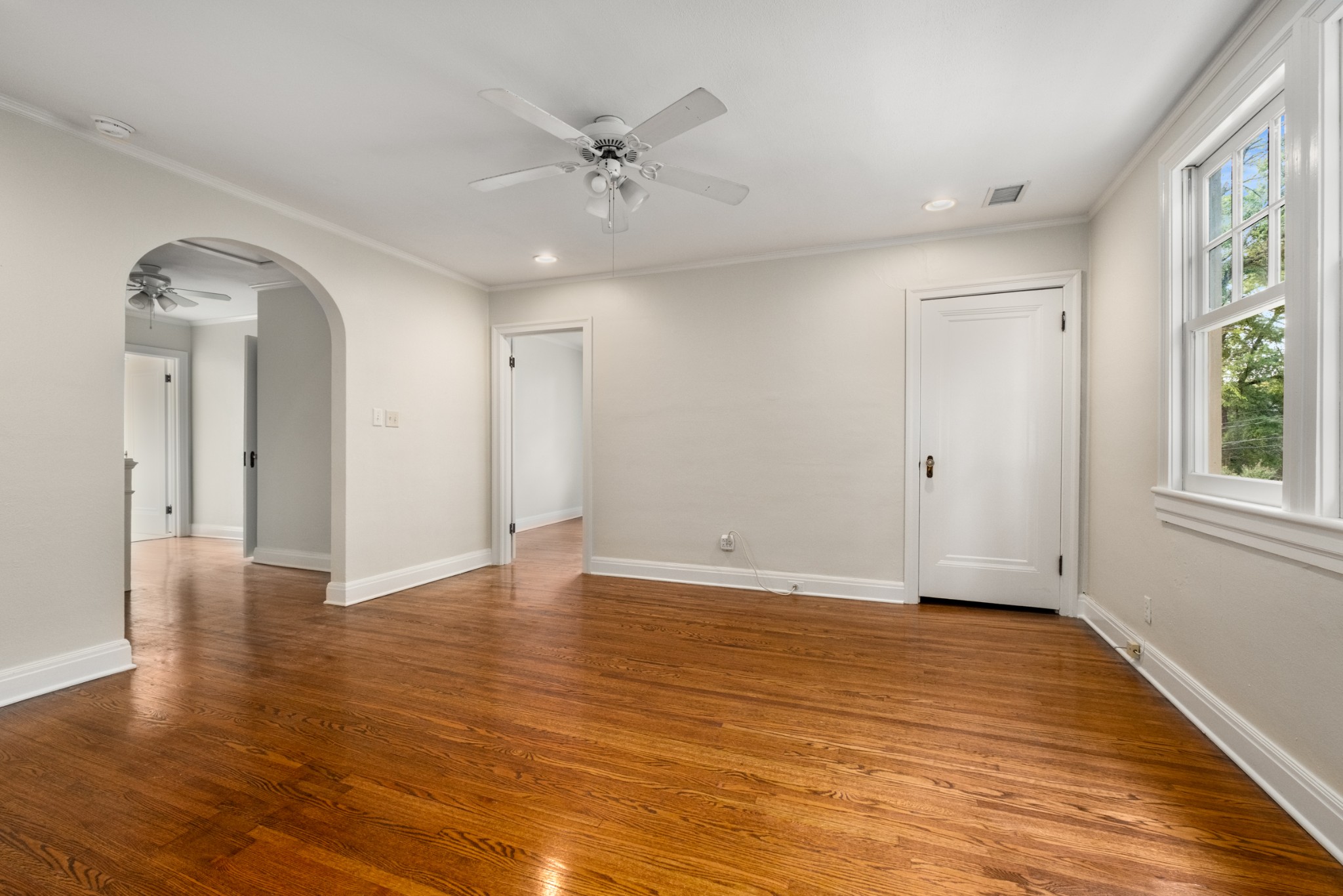 205 Mockingbird Road Nashville, TN 37205 - Photo 15 of 18 a view of an empty room with wooden floor and a window