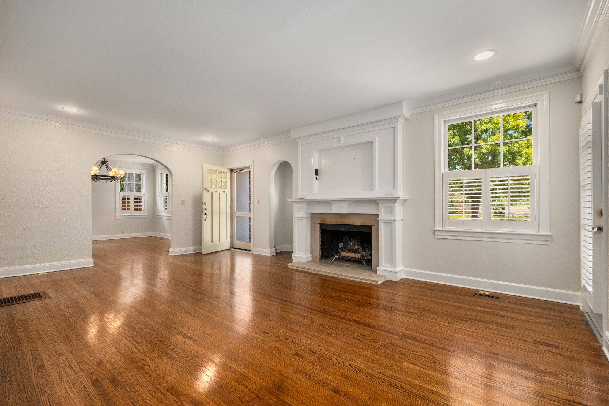 205 Mockingbird Road Nashville, TN 37205 - Photo 4 of 18 a view of an empty room with wooden floor and a window