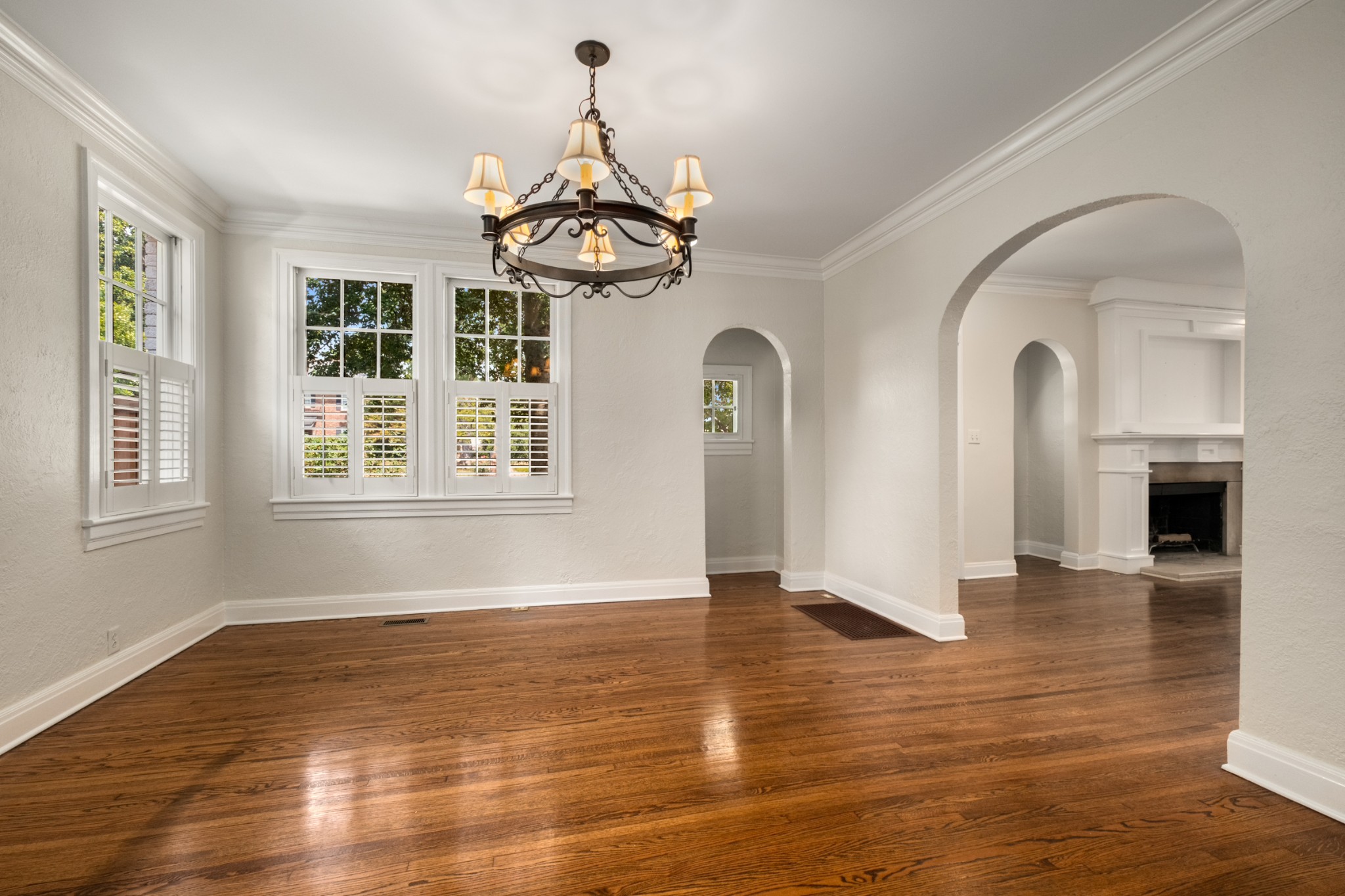 205 Mockingbird Road Nashville, TN 37205 - Photo 5 of 18 a view of a livingroom with wooden floor and a chandelier