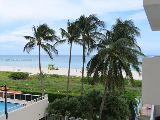 a view of swimming pool from a yard