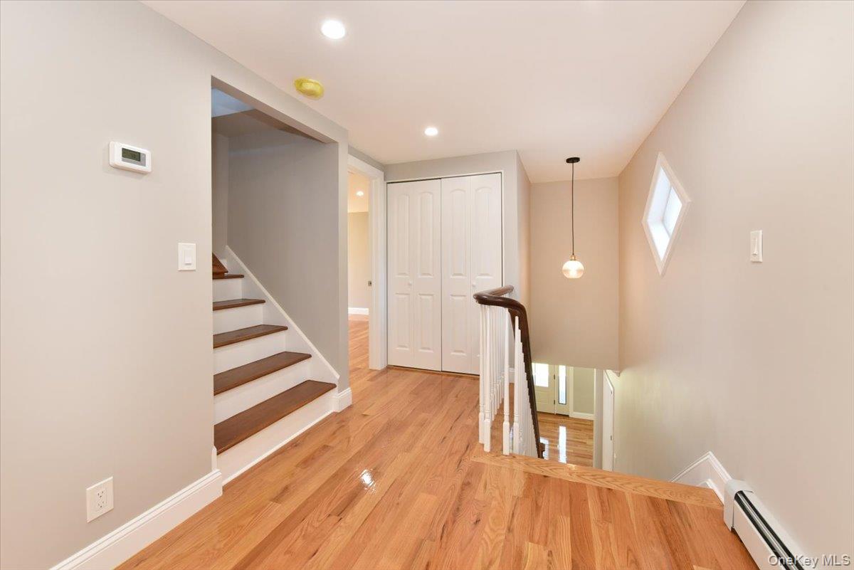 87 Dunlop Road Huntington, NY 11743 - Photo 16 of 31 a view of entryway with wooden floor