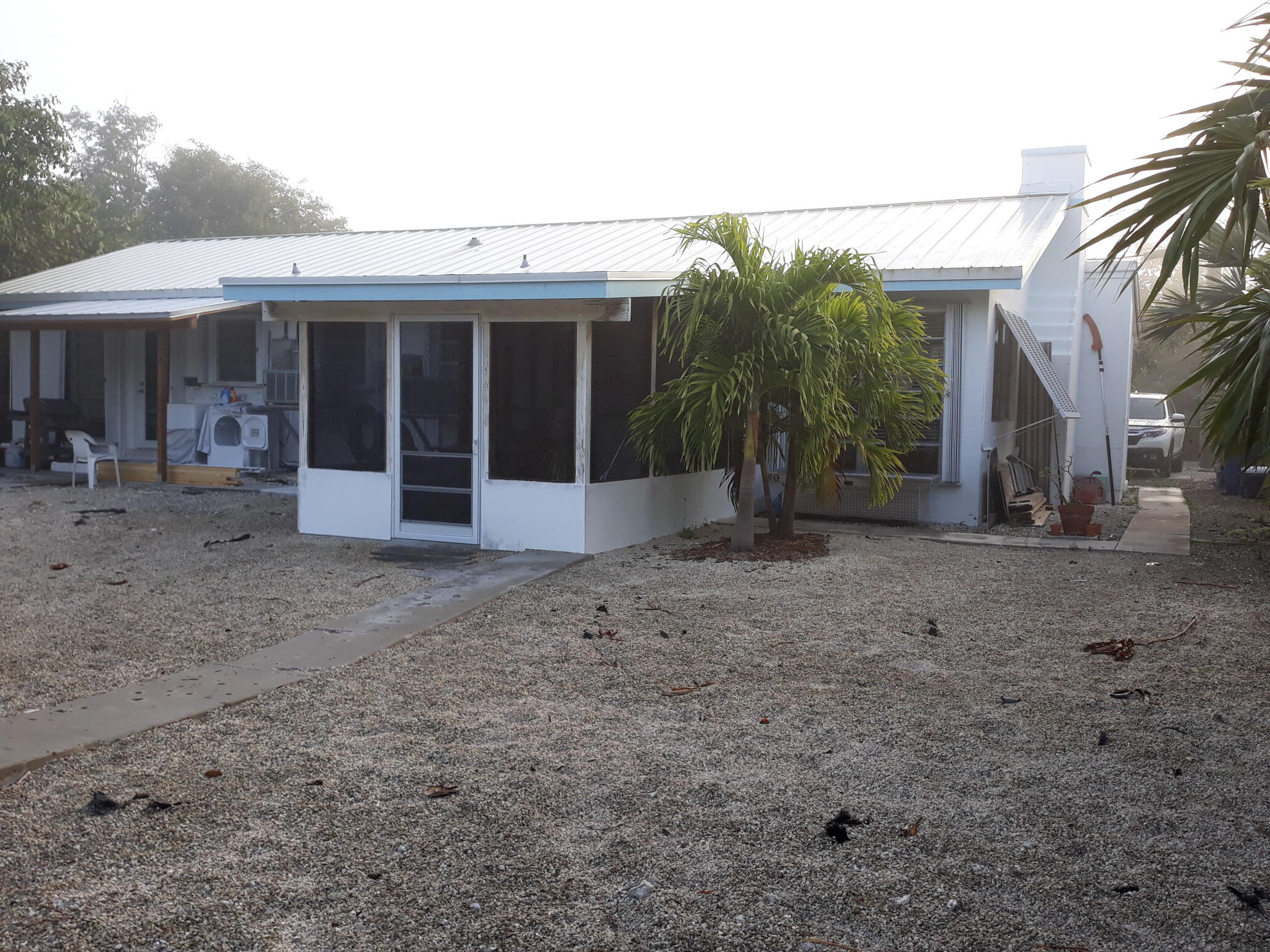 3854-3856 No Name Road Big Pine Key, FL 33043 - Photo 14 of 19 Screened porch in backyard