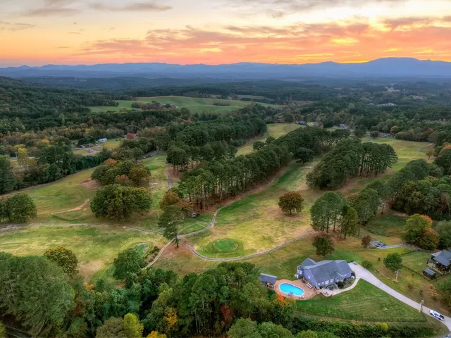a view of a lake with mountains in the background