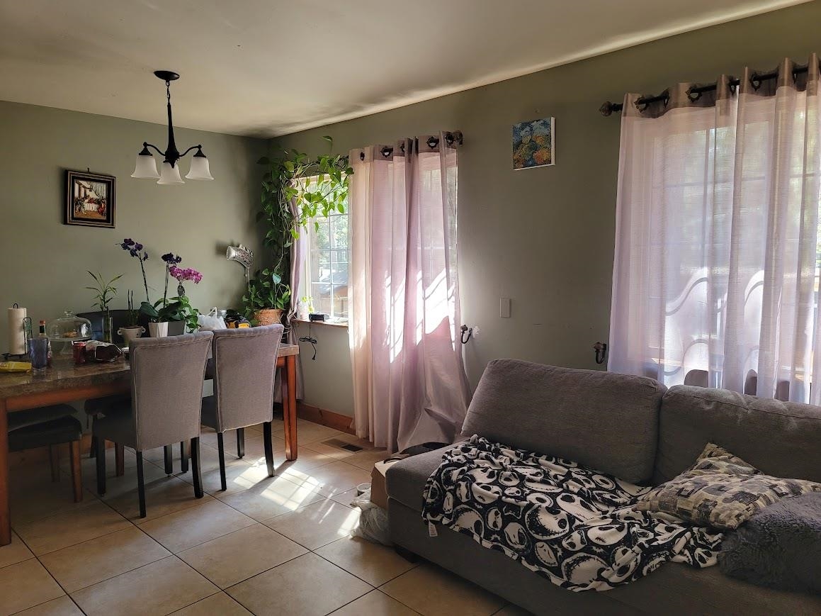 8630 Steelhead Avenue, Unit 13 Kings Beach, CA 96143 - Photo 11 of 28 a bedroom with furniture and a window