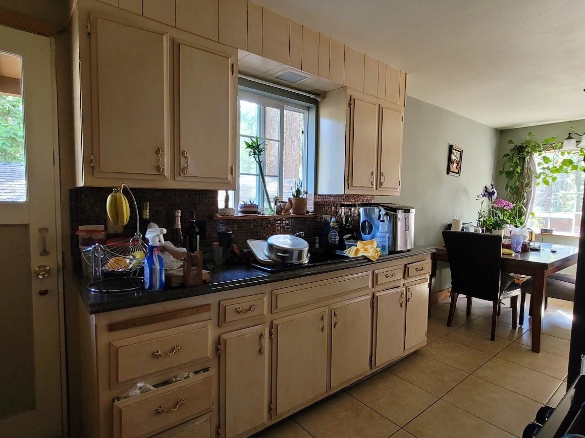 8630 Steelhead Avenue, Unit 13 Kings Beach, CA 96143 - Photo 12 of 28 a kitchen with refrigerator and cabinets