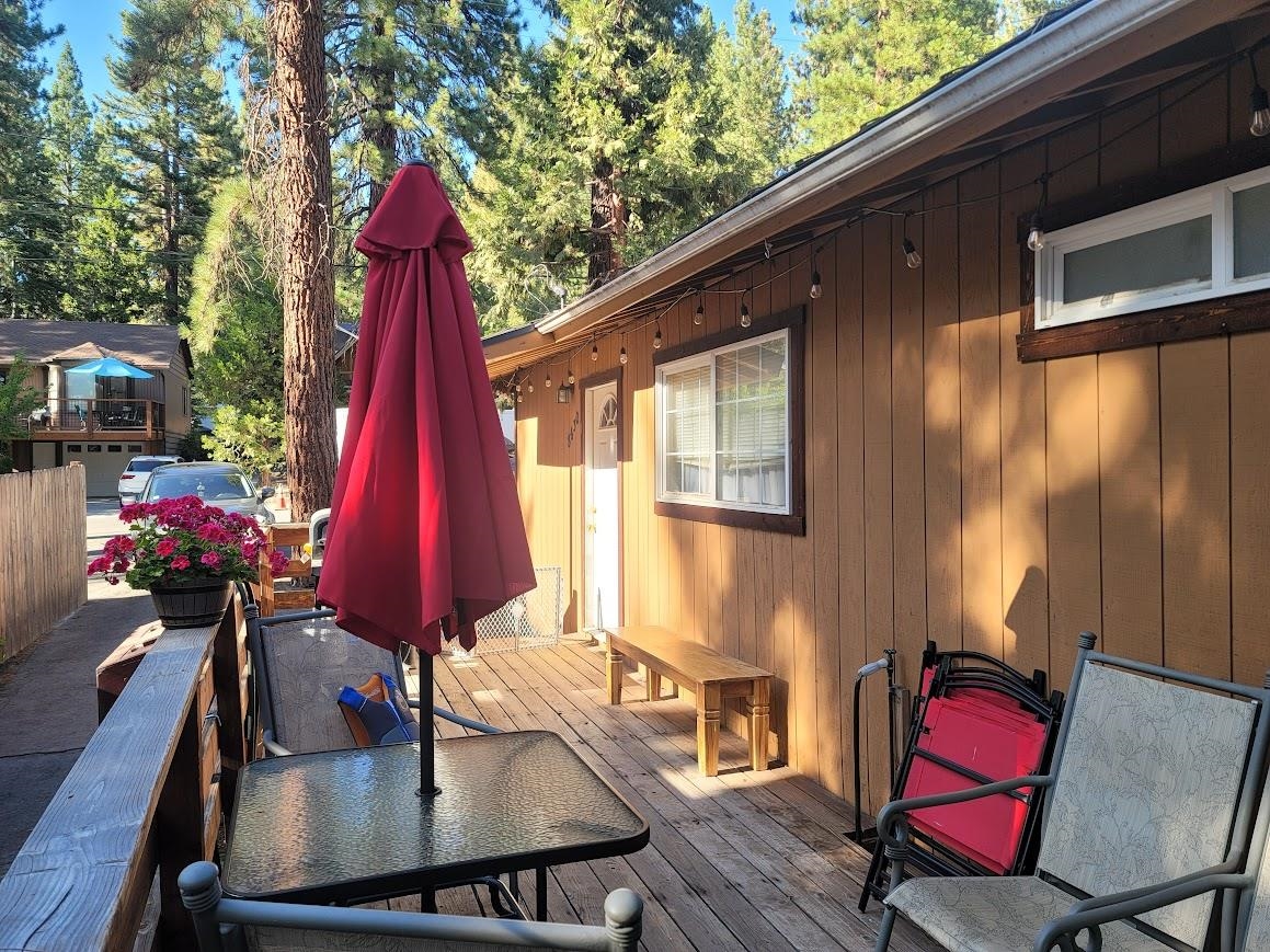 8630 Steelhead Avenue, Unit 13 Kings Beach, CA 96143 - Photo 13 of 28 a view of a dining room with furniture and window