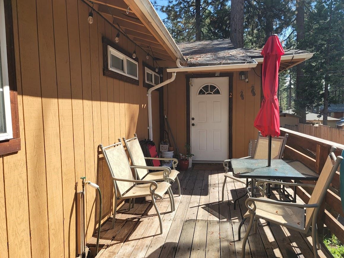 8630 Steelhead Avenue, Unit 13 Kings Beach, CA 96143 - Photo 20 of 28 a front view of a house with outdoor seating