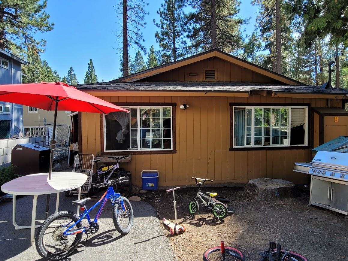 8630 Steelhead Avenue, Unit 13 Kings Beach, CA 96143 - Photo 2 of 28 a front view of a house with patio