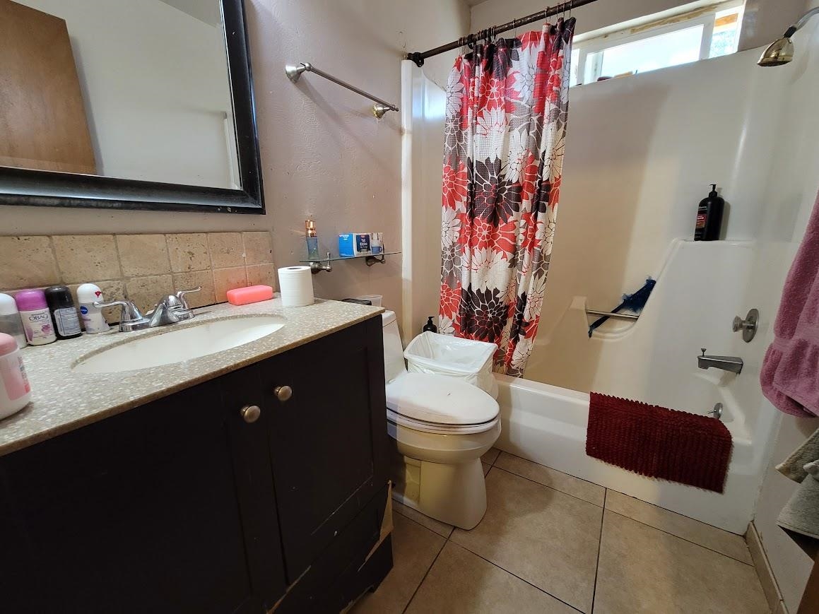 8630 Steelhead Avenue, Unit 13 Kings Beach, CA 96143 - Photo 23 of 28 a bathroom with a sink toilet and shower