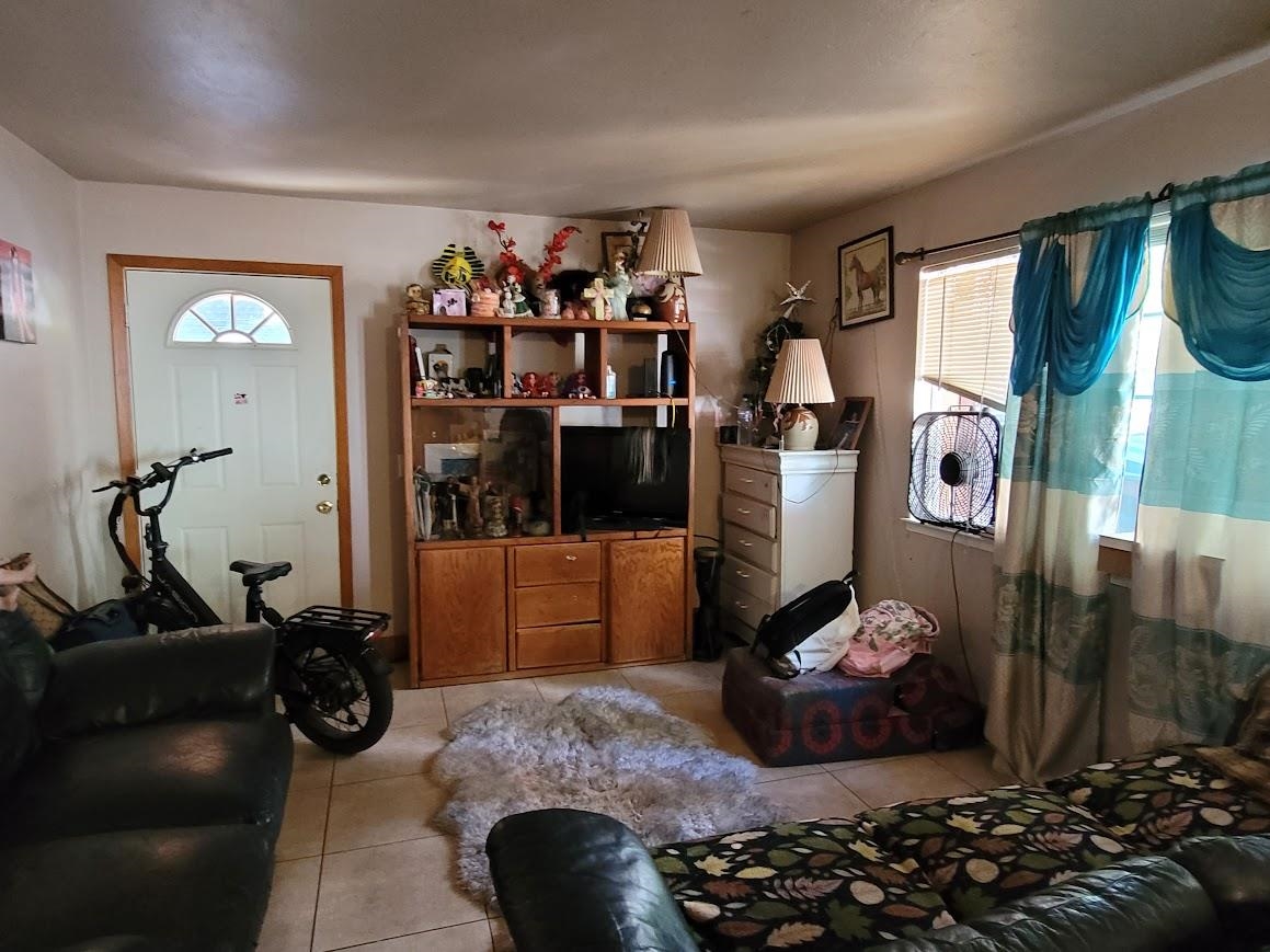 8630 Steelhead Avenue, Unit 13 Kings Beach, CA 96143 - Photo 26 of 28 a living room with furniture and a closet