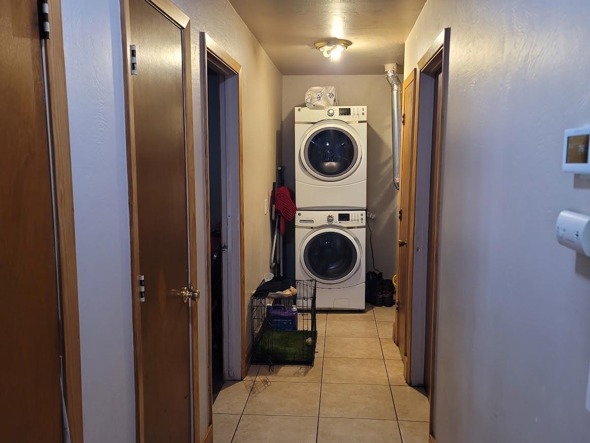8630 Steelhead Avenue, Unit 13 Kings Beach, CA 96143 - Photo 27 of 28 a view of a hallway with washer and dryer